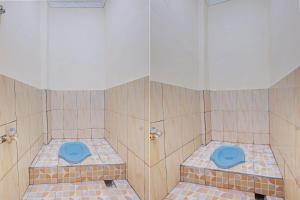 Letto o letti in una camera di SPOT ON 92934 Nusantara Syariah