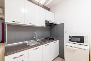 Kuchyň nebo kuchyňský kout v ubytování Apartments with parking space Rabac, Labin - 6464