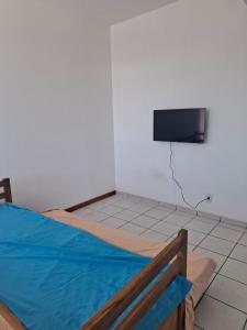 TV a/nebo společenská místnost v ubytování Apt Praia do Sique 12