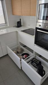 Kuchyň nebo kuchyňský kout v ubytování Santa Cruz Villas