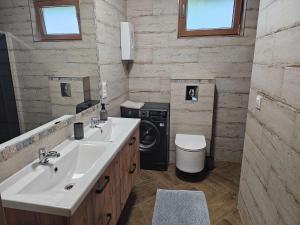 Gallery image of Holiday Home by Lake Wierzchowo with Private Beach in Grąbczyn +21 photos