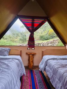 Ένα ή περισσότερα κρεβάτια σε δωμάτιο στο Salkantay Glamp