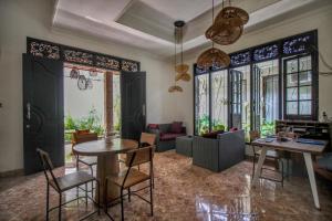 Posezení v ubytování ODA Guest House Ubud