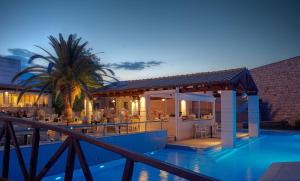 a resort with a pool and a restaurant at Olympian Bay Grand Resort by Anayia All Inclusive Resorts in Leptokarya