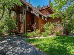 a wooden house with a yard in front of it at THC0649 - Third Creek Comfort in Incline Village