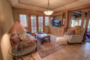 a living room with a couch and a tv at THC0649 - Third Creek Comfort in Incline Village