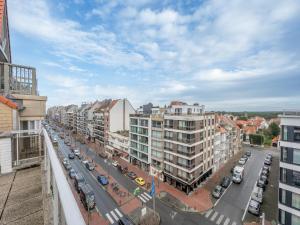 an aerial view of a city street with buildings at Stylish City-View Retreat in Knokke-Heist +32 photos