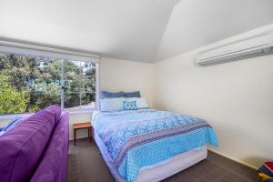 Ένα ή περισσότερα κρεβάτια σε δωμάτιο στο Retro Gem on Jackson +10 φωτογραφίες