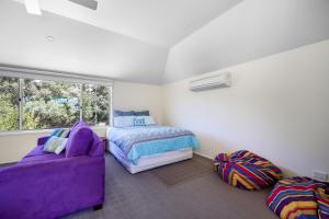 Ένα ή περισσότερα κρεβάτια σε δωμάτιο στο Retro Gem on Jackson