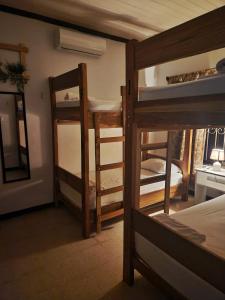 Rúm í herbergi á Hostel El Pretal