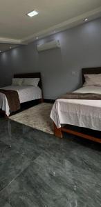 Cama o camas de una habitación en Pousada Cascata de Pedra