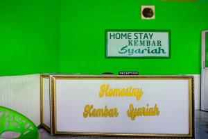 Majutusasutuses OYO 93071 Home Stay Kembar Syariah olev sertifikaat, autasu, silt või muu dokument