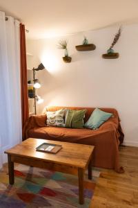 Et opholdsområde på Meublé de tourisme 3 étoiles Les Berges de Marne