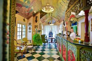 Reštaurácia alebo iné gastronomické zariadenie v ubytovaní Hotel Garden