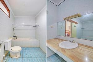 Koupelna v ubytování Capital O 93236 Hotel Hapel Negara