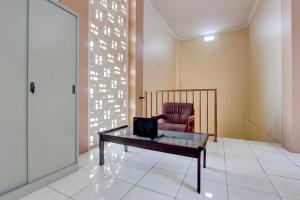 Posezení v ubytování SPOT ON 93245 Guest House Mulia Dua Syariah