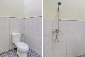 Koupelna v ubytování SPOT ON 93245 Guest House Mulia Dua Syariah