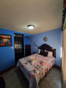 Postel nebo postele na pokoji v ubytování Hotel Luisito + 4 fotografie