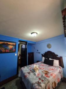 Postel nebo postele na pokoji v ubytování Hotel Luisito