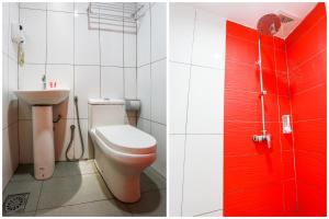 Koupelna v ubytování OYO 90894 Hotel Smc I-city