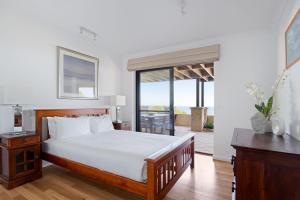 Postel nebo postele na pokoji v ubytování Ocean Views I Private Properties