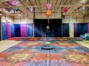 a large room with a large rug on the floor at Amazing Escape near LA Meditation Room, Game room, Hot Tub, Pool in Leona Valley +39 photos