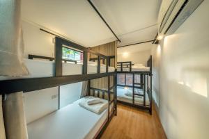 Ένα ή περισσότερα κρεβάτια σε δωμάτιο στο SHIN Hostel Changphuak ChiangMai +43 φωτογραφίες