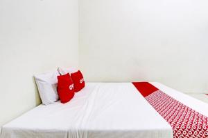 Фотография из галереи Hotel O Guest House Cemara 2 в городе Brebes