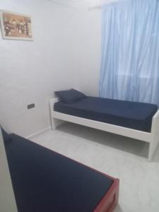 Postel nebo postele na pokoji v ubytování Appartement al houceima