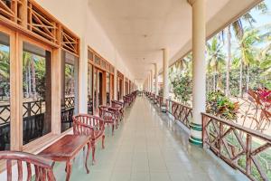 Balkón nebo terasa v ubytování Capital O 93236 Hotel Hapel Negara