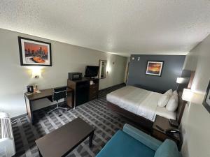 Postel nebo postele na pokoji v ubytování Quality Inn