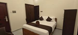 Voodi või voodid majutusasutuse Rv Resorts Yercaud toas