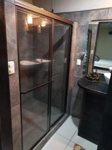 Koupelna v ubytování Cabinas la Antorcha + 30 fotografií