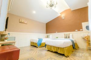 Postel nebo postele na pokoji v ubytování Hai Yuan Bungalow II