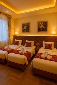 Letto o letti in una camera di Hotel next home