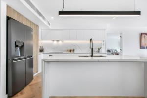 Η κουζίνα ή μικρή κουζίνα στο Luxury Penthouse with Terrace & Breathtaking Views