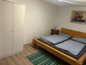 Postel nebo postele na pokoji v ubytování FERIENHAUS AyNa, direkt an der Schweizer Grenze