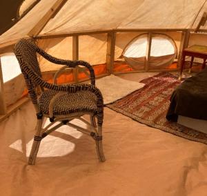 Ένα ή περισσότερα κρεβάτια σε δωμάτιο στο The Yurt at Tribal Camp