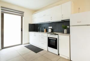 Dapur atau dapur kecil di Elysee apartment 1 +6 gambar