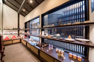 a display case in a store with a lot of food at Maki No Oto Kanazawa in Kanazawa