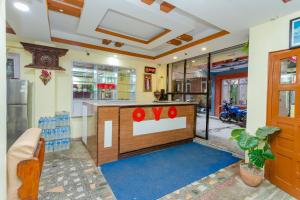 Eldhús eða eldhúskrókur á OYO 811 Hotel New Pokhara Palace