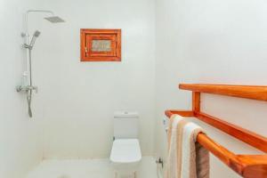 Koupelna v ubytování Tikipalmbeachhotel