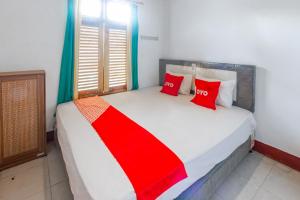 Photo de la galerie de l'établissement OYO 93729 Radesa Family Homestay, à Kuta Lombok