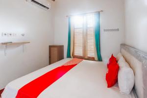 Photo de la galerie de l'établissement OYO 93729 Radesa Family Homestay, à Kuta Lombok 18 autres photos