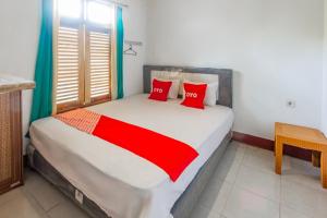 Photo de la galerie de l'établissement OYO 93729 Radesa Family Homestay, à Kuta Lombok