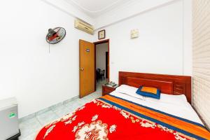 Postel nebo postele na pokoji v ubytování Binh Minh Ngoc Khanh Hotel