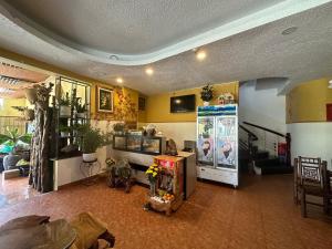 Kuchyň nebo kuchyňský kout v ubytování OYO 1232 Pòn Pon Hostel + 35 fotografií