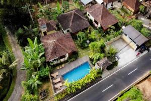 Bazén v ubytování Belvilla Chaitanya Niketan nebo v jeho okolí