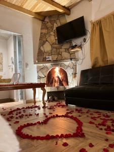Un televizor și/sau centru de divertisment la Cabaña Zacatlan Jacuzzi