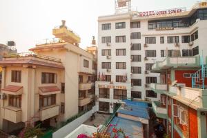 an overhead view of a building with buildings at OYO 818 Hotel Queen Tower in Kathmandu